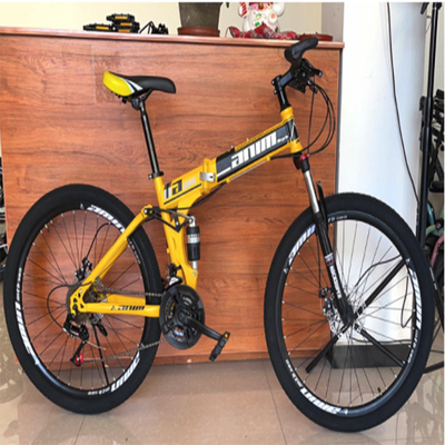 大人120kg折り畳み式山の自転車の炭素鋼のさまざまな速度の調節